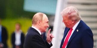 Two political leaders shaking hands during a meeting