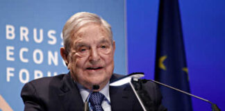 Man speaking at Brussels Economic Forum podium