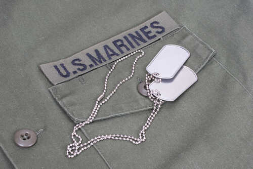 shutterstock_145529806.jpg Close-up of a U.S. Marines uniform with dog tags
