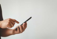 Person using a smartphone with one hand