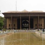 UNESCO Site DESTROYED — U.S.-Israel Strike Sparks Outrage A historical building surrounded by greenery and a reflection pool
