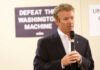 Rand Paul’s Surprising Restraint Amid Insult Drama A man speaking into a microphone at a campaign event