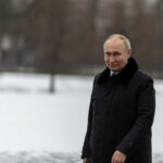 Oil Surge Saves Putin’s Budget — For Now man in black trench coat