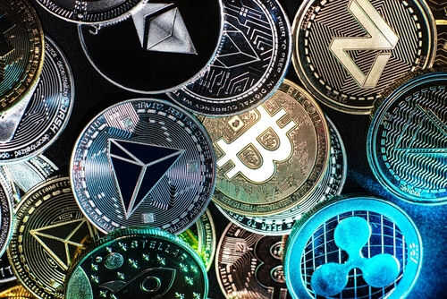 Various cryptocurrency coins with different symbols displayed