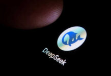 Finger touching phone screen showing DeepSeek logo
