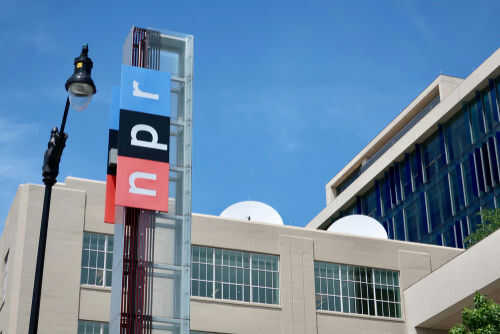 NPR building with logo and streetlight nearby