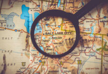 A map of Salt Lake City, Utah, viewed through a magnifying glass