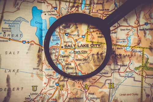 A map of Salt Lake City, Utah, viewed through a magnifying glass