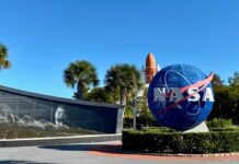NASA logo and memorial wall featuring John F. Kennedy