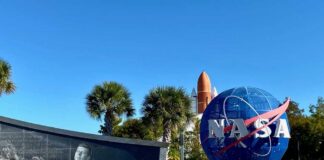 NASA logo and memorial wall featuring John F. Kennedy