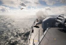 U.S. Navy Moves In—Massive Blockade Begins Monday Naval ship firing a weapon into the ocean with a plane flying overhead