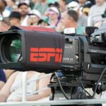 Broadcast camera with ESPN branding at a sports event