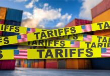 Stagflation Shock Looms—Is America Prepared? Yellow caution tape with the word 'TARIFFS' over a background of shipping containers