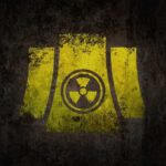 Yellow radiation symbol on a dark, textured background