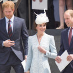 Members of the royal family at an outdoor event, dressed in formal attire