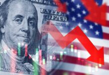 US dollar bill with red downward arrow and stock chart