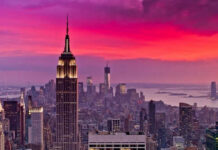 City skyline at sunset with colorful sky