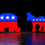 Red and blue elephant and donkey symbols dark background