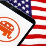 Smartphone displaying the Republican Party logo in front of an American flag