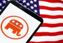 Trump’s Shock Move: GOP Faces ‘Squish’ Elimination Smartphone displaying the Republican Party logo in front of an American flag