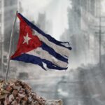 Cuba CALLS OUT Rubio as Liar – UNBELIEVABLE! Worn Cuban flag standing on rubble in a desolate urban environment