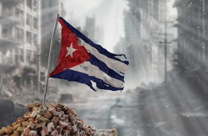 Dirty,And,Torn,Cuba,Flag,,Symbol,Of,Resistance,And,Victory. Worn Cuban flag standing on rubble in a desolate urban environment