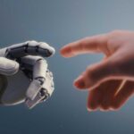 A robotic hand reaching out to touch a human hand