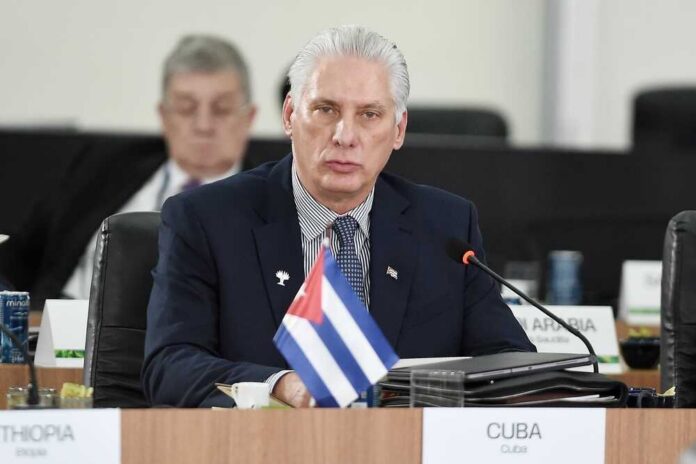 Rio,De,Janeiro,,Brazil,,July,6,,2025.,President,Of,Cuba, Cuban representative at a political meeting with a flag on the table