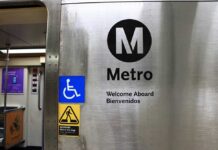 Budget Deficits Loom: Transit Cuts Despite Ridership Gains Metro sign with accessibility symbols and bilingual welcome message