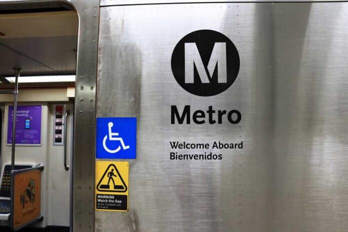 shutterstock_2724561239.jpg Metro sign with accessibility symbols and bilingual welcome message