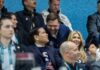 Group of people enjoying a sports event with smiles and laughter