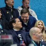 Group of people enjoying a sports event with smiles and laughter