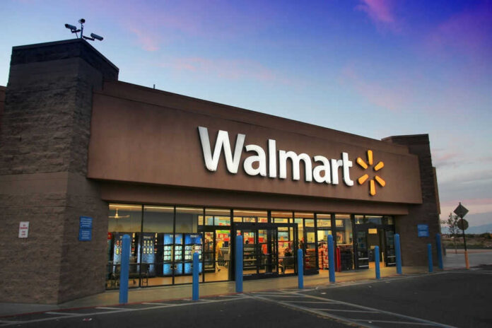 walmartid2183641323jpg Front entrance of a Walmart store at dusk.