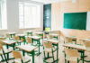 Shock Shift Inside America’s Classrooms Empty classroom with desks facing a chalkboard