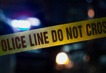 Scotland Panic—Narrative Locks In Fast Police tape with do not cross message at night