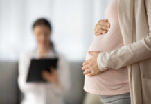 Abortion Limits Loosen—Europe Feels The Jolt Pregnant person holding their belly during a medical visit