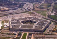 Wall Street Bankers Seize Pentagon Levers Aerial view of the Pentagon surrounded by roads and parking lots