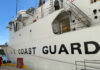 U.S. Coast Guard Intercepts Boat Packed With 240 Migrants coast guard vessel docked at a pier