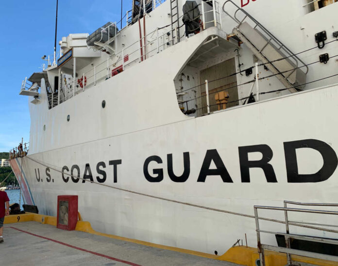 Huatulco,,Mexico,-,October,2019:,U.s.coast,Guard,Ship,In,Port coast guard vessel docked at a pier