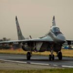 Jets On Ice Until Kyiv Shares Blueprints F-16 fighter jet on an airbase during sunset