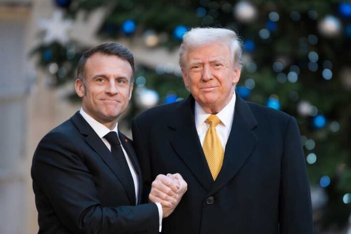 Paris,,France,-,Dec.,7,,2024,:,Emmanuel,Macron,Welcoming Two political leaders shaking hands in front of a decorated backdrop