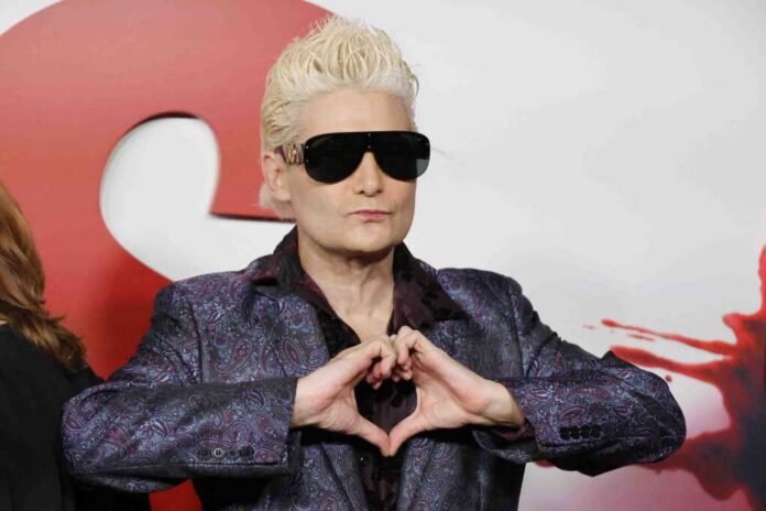 Los,Angeles,-,February,3,,2025:,Corey,Feldman,At,The airplane cabin with passengers seated in rows