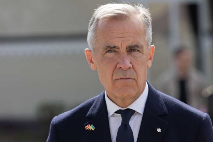 Kyiv,,Ukraine,24,August,2025.,Prime,Minister,Of,Canada,Mark A man in formal attire with a serious expression outdoors