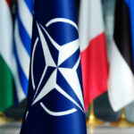 NATO flag in front of various national flags