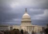 Ethics Firestorm Over Pink-And-Blue Pistols United States Capitol building under dark storm clouds