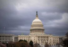 Ethics Firestorm Over Pink-And-Blue Pistols United States Capitol building under dark storm clouds