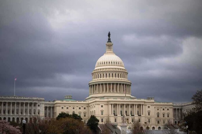 shutterstock_1692755728 United States Capitol building under dark storm clouds