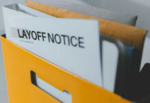 8,000 Vanish—Who Really Pulled The Trigger? A yellow folder containing a layoff notice and other documents