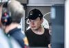 “America Is Toast” — Musk Goes All‑In man in black cap looks ahead indoors