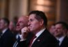 Patriotic Power Play: Dell Drops $6.25B Office of Education sign in landscaped garden
